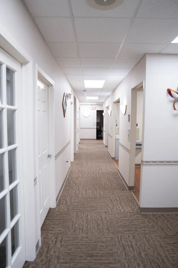 Hallway leading to treatment rooms at Revive Dental